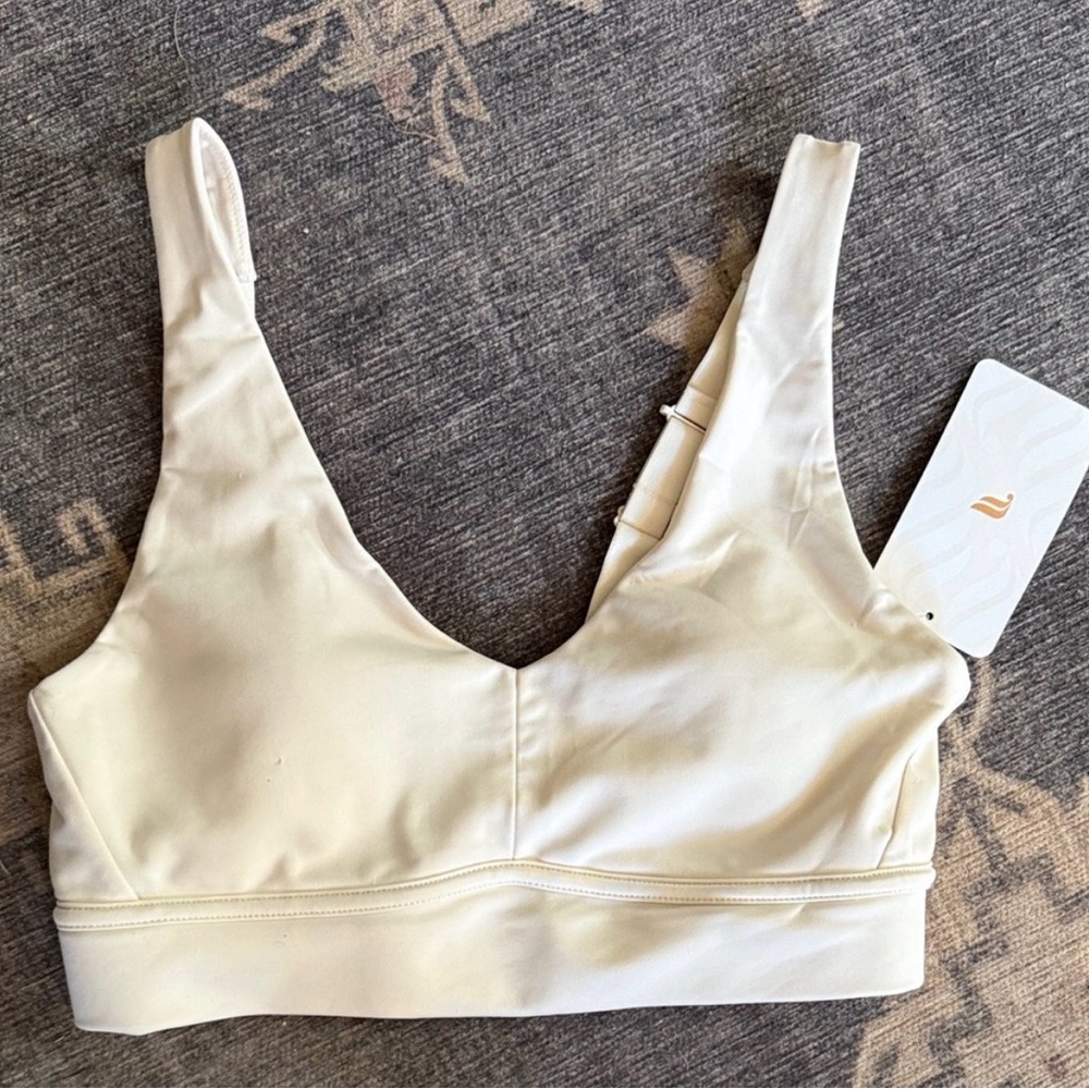 NWT Fabletics Ivory V-Neck Wireless Sports Bra. Size medium.